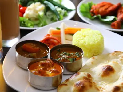 a plate of food with different types of food on it at APA Hotel Ginza Kyobashi Minami Tokyo Station Yaesu South Gate in Tokyo
