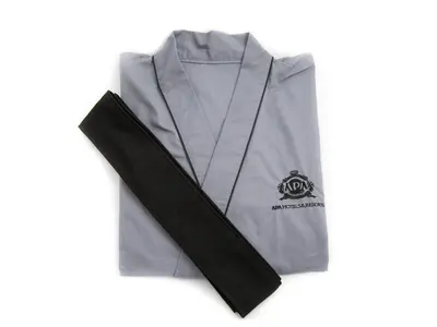 a grey shirt with a black ribbon on it at APA Hotel Ginza Kyobashi Minami Tokyo Station Yaesu South Gate in Tokyo