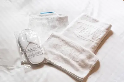 a pair of white socks and a pair of shoes at Pearl Hotel Ryogoku in Tokyo