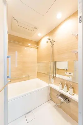 a bathroom with a bath tub and a sink at HIZ HOTEL - Vacation STAY 18549v in Tokyo