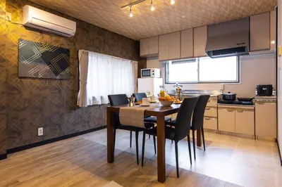 a kitchen and dining room with a table and chairs at Urban Stay Oshiage in Tokyo