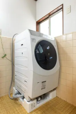 a computer monitor sitting on a shelf in a room at Urban Stay Aoto in Tokyo