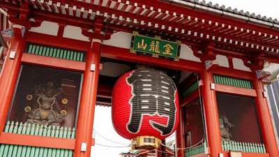 a building with a red sign at Toyoko Inn Tokyo Akiba Asakusabashi-eki Higashi-guchi in Tokyo