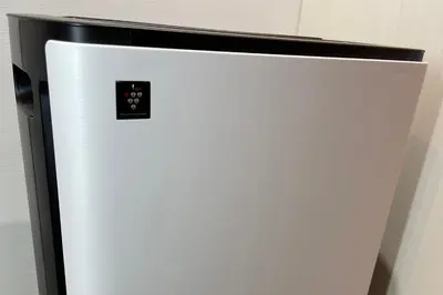 a white refrigerator freezer sitting in a kitchen at Asta Hotel in Tokyo