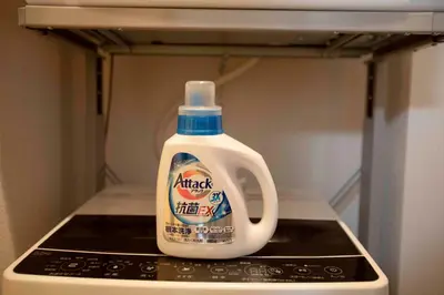 a jug of milk sitting in the inside of a refrigerator at Papa201 in Tokyo