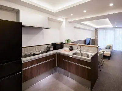 a kitchen with a sink and a counter at Minn Asakusa in Tokyo