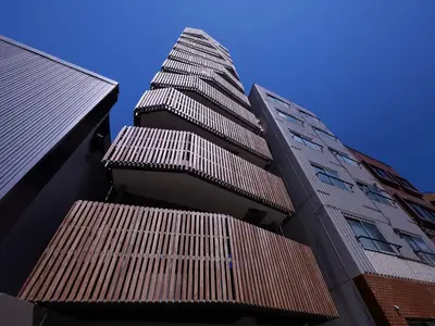 a tall building with a view from the bottom at Minn Asakusa in Tokyo