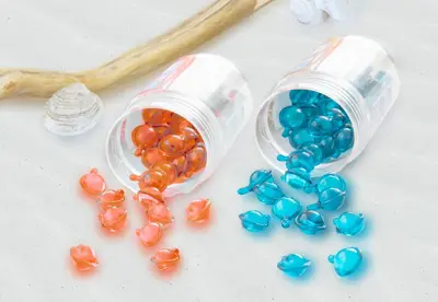 a bottle of beads and a wooden spoon at Oriental Hotel Tokyo Bay in Urayasu