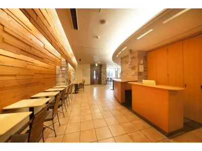 a row of tables and chairs in a restaurant at R&B HOTEL HIGASHI NIHONBASHI - Vacation STAY 14017v in Tokyo