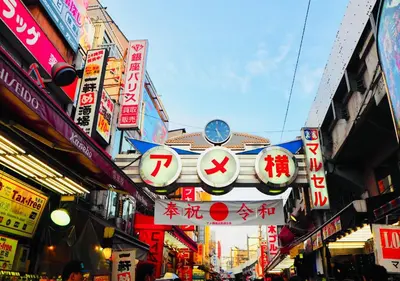 a group of signs on the side of a street at APA Hotel Ueno Ekimae in Tokyo