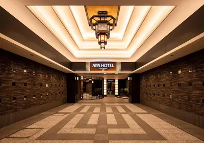 a hallway of a building with a ceiling at APA Hotel Ueno Ekimae in Tokyo