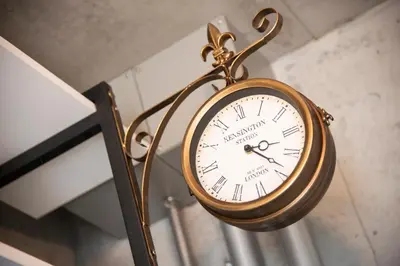 a clock hanging from the ceiling in a room at Oyado danran \u56e3\u6b12 in Tokyo