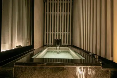 a bath tub in a room with a window at Hotel Karuta -Love hotel in Tokyo