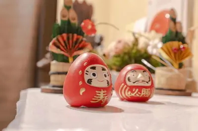 two red eggs with faces on them sitting on a table at Jing House akihabara Ryokan - Vacation STAY 30887v in Tokyo
