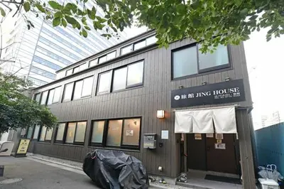 a building with a trash bag in front of it at Jing House akihabara Ryokan - Vacation STAY 30887v in Tokyo