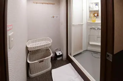 a small bathroom with a sink and a toilet at Jing House akihabara Ryokan - Vacation STAY 11566v in Tokyo