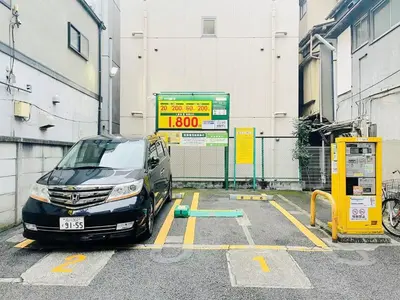 a car is parked at a gas pump at SKYE HOME in Tokyo
