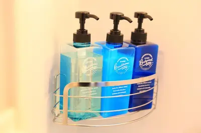 two bottles ofodorizers are hanging on a wall at Wonderful stay TOKYO - Vacation STAY 30862v in Tokyo