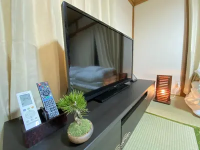 a large flat screen tv sitting on top of a table at wonderful stay TOKYO Daitabashi - Vacation STAY 31675v in Tokyo