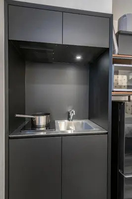a kitchen with a sink and a stove at Serendipity Kinshicho - 7 mins to JR Station - Near Skytree & Foodie hub in Tokyo