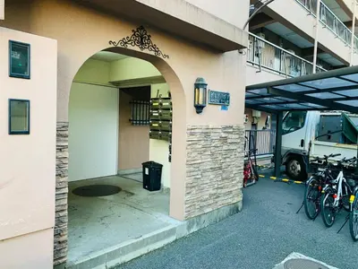 an entrance to a building with bikes parked outside at K&M Heights - Vacation STAY 32224v in Tokyo