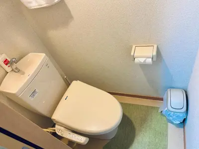 a bathroom with a white toilet and a paper dispenser at K&M Heights - Vacation STAY 32224v in Tokyo