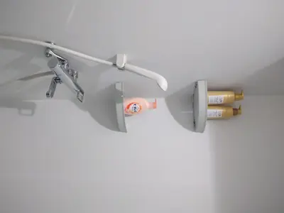 a pair of glasses hanging from a wall at Hitoyado Ryokan Higashiueno - Vacation STAY 35819v in Tokyo