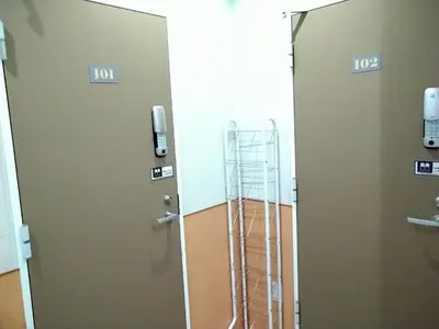 an open door with a cage in a room at Hitoyado Ryokan Higashiueno - Vacation STAY 35819v in Tokyo