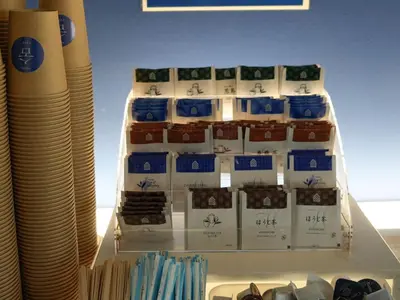 a display of products in a store with writing on it at Rembrandt Cabin Shinjuku Shin-Okubo in Tokyo