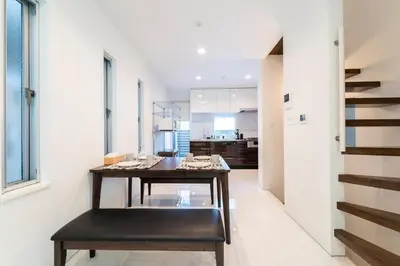 a dining room with a table and a bench at Shibuya-ku - House - Vacation STAY 11243 in Tokyo