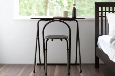 a black table with a stool next to a bed at Shibuya-ku - House - Vacation STAY 11243 in Tokyo