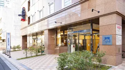 a store front of a building on a city street at Toyoko Inn Tokyo Asakusa Kuramae No.2 in Tokyo