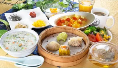 a table with a bowl of soup and bowls of food at Hotel Sunroute Asakusa in Tokyo