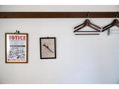 a wall with three pictures and a sign on it at Hotel Emit Shibuya - Vacation STAY 40890v in Tokyo