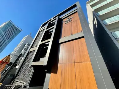 a building with wooden doors on the side of it at Hotel Emit Shibuya - Vacation STAY 40894v in Tokyo