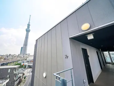 a building with a view of the eiffel tower at Rakuten STAY Tokyo Asakusa Twin Room in Tokyo