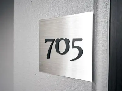 a white clock on a wall with the number at Rakuten STAY Tokyo Asakusa Okaimono Panda Double Room in Tokyo