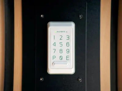a remote control on a black wall with a thermometer at Rakuten STAY Tokyo Asakusa Okaimono Panda Twin Room A in Tokyo
