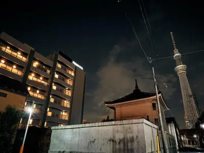 a view of the eiffel tower at night at Rakuten STAY Tokyo Asakusa Okaimono Panda Twin Room A in Tokyo