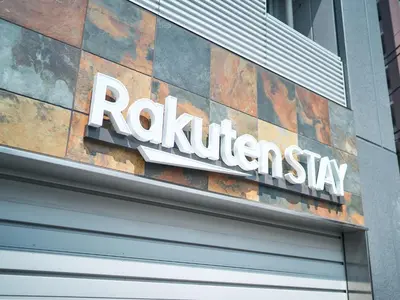 a sign on the side of a building at Rakuten STAY Tokyo Asakusa Okaimono Panda Twin Room B in Tokyo