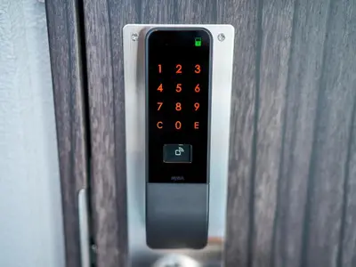 a remote control is attached to a door at Rakuten STAY Tokyo Asakusa Okaimono Panda Twin Room B in Tokyo