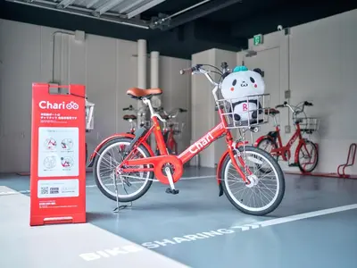 a red bike parked in a room with two other bikes at Rakuten STAY Tokyo Asakusa Okaimono Panda Twin Room B in Tokyo