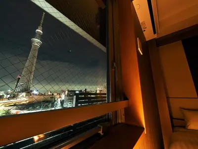 a window with a view of the eiffel tower at Rakuten STAY Tokyo Asakusa Twin Room with Unit Bath in Tokyo