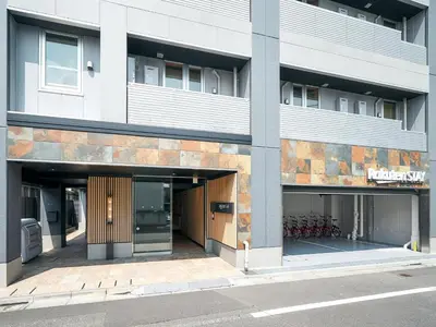 an entrance to a building with a parking garage at Rakuten STAY Tokyo Asakusa 1 Double Bed Room in Tokyo