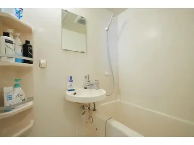 a white bathroom with a sink and a bath tub at La Mer Urayasu - Vacation STAY 11148 in Urayasu