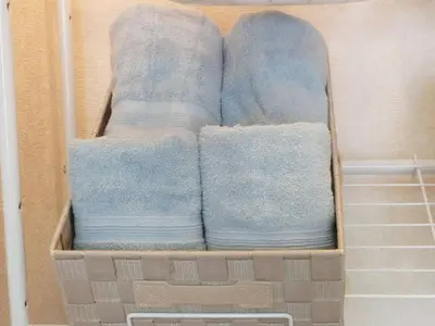 a box filled with blue towels in a closet at Grandeur Imagawa - Vacation STAY 11149 in Urayasu