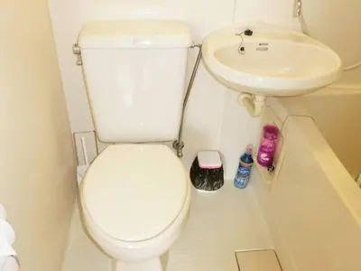 a small bathroom with a toilet and a sink at Grandeur Imagawa - Vacation STAY 11149 in Urayasu