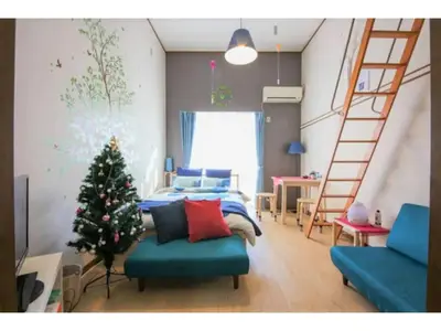 a bedroom with a christmas tree and a bed at Maison Cresta Urayasu - Vacation STAY 11150 in Urayasu