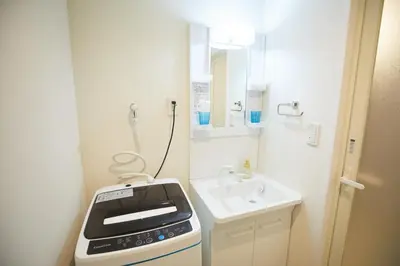 a small kitchen with a stove and a sink at SG Premium KASAI - Vacation STAY 44353v in Tokyo
