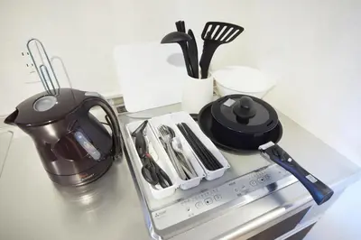 a counter top with a tea kettle and utensils at SG Premium KASAI - Vacation STAY 44353v in Tokyo